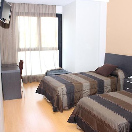Hotel Ciutat D'암포스타 객실 사진