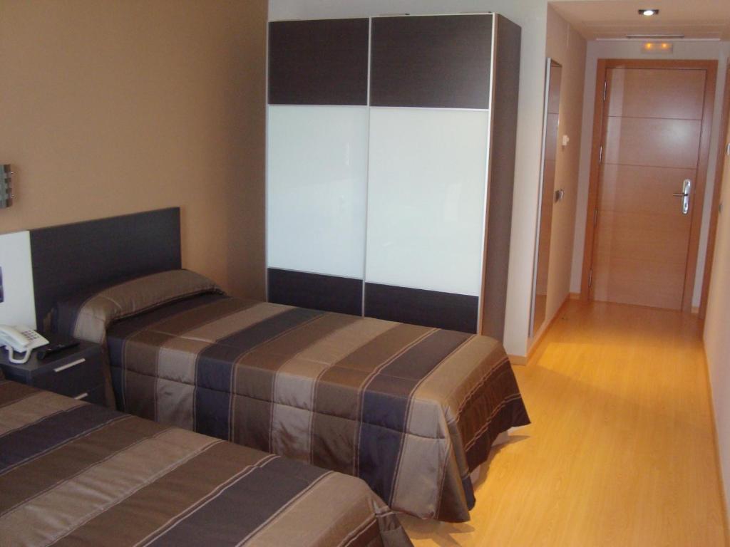 Hotel Ciutat D'암포스타 객실 사진